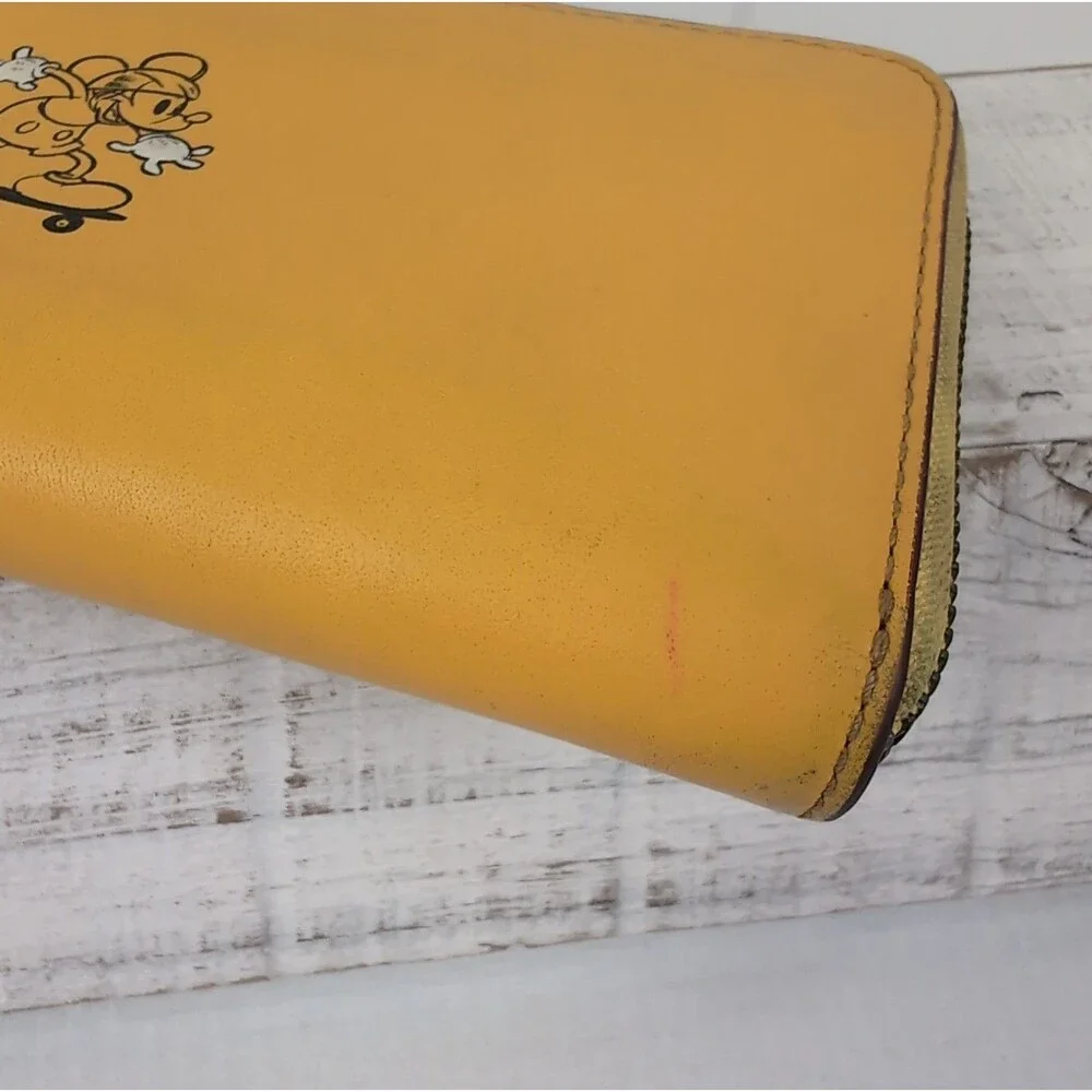 Coach + Disney Mickey Mouse Skateboard Yellow Leather Accordion Zip Wallet